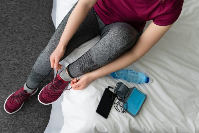 Woman getting ready for morning run. Concept sports.