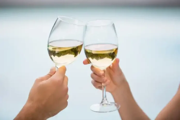 depositphotos_102618532-stock-photo-couple-toasting-white-wine