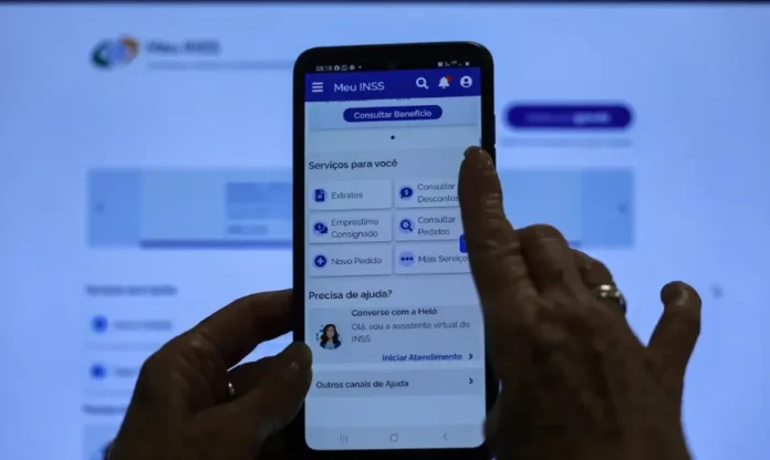 INSS alerta beneficiários sobre golpe na Prova de Vida Tela de celular exibindo o aplicativo "Meu INSS", ilustrando o golpe da Prova de Vida e o alerta do INSS aos beneficiários.