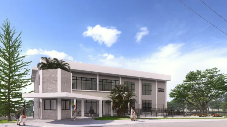 Renderização da fachada principal da Cidade do Autista em Criciúma, mostrando a entrada acessível e o design moderno do prédio de três pavimentos, que atenderá crianças com TEA.