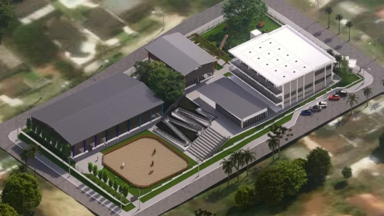 Renderização aérea isométrica do complexo da Cidade do Autista em Criciúma, exibindo a disposição dos três edifícios, a área de equoterapia e o playground, em uma visão ampliada do terreno.