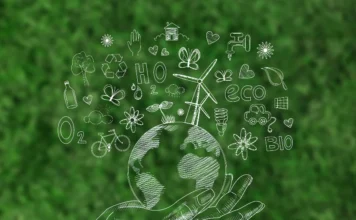 FIESC apresenta quatro projetos de SC na COP30 Ilustração de uma mão segurando o planeta Terra, cercado por ícones como turbina eólica, reciclagem e "O2", simbolizando a sustentabilidade e os quatro projetos de economia circular e energia limpa que a FIESC de Santa Catarina apresenta na COP30.