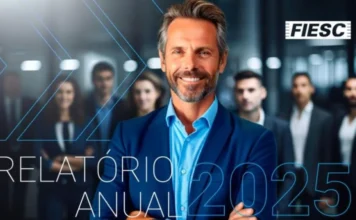 FIESC investe R$ 391,4 milhões em Santa Catarina em 2025 Imagem de capa do Relatório Anual 2025 da FIESC, mostrando um homem de terno azul sorrindo em primeiro plano, com outros profissionais ao fundo. O texto "RELATÓRIO ANUAL 2025" aparece em destaque na parte inferior, acompanhado pelo logotipo da FIESC no canto superior direito.