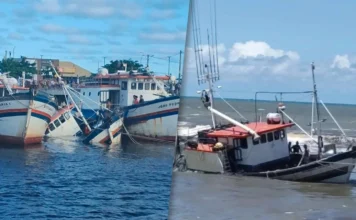 Barco encalha na barra do Rio Mampituba em Passo de Torres