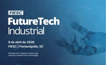 Evento em SC conecta indústrias e setor de tecnologia Peça gráfica em tons de azul com a logomarca da FIESC e o título "FutureTech Industrial". O texto informa a data de 9 de abril de 2026 e o local, a sede da FIESC em Florianópolis. Ao fundo, uma ilustração de uma mão robótica e elementos de circuitos digitais reforçam o tema de tecnologia e inovação industrial.