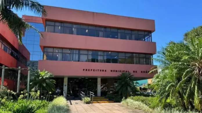 fachada-da-prefeitura-municipal-de-osorio-em-dia-ensolarado-com-vegetacao-em-primeiro-plano-20250609170237-1024x576 (1)