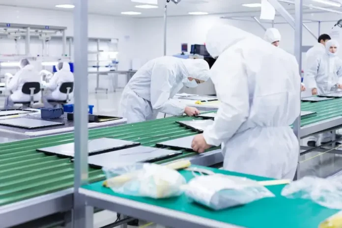 factory-workers-white-lab-suits-face-masks-producing-tv-sets-green-assembly-line.jpg (1)