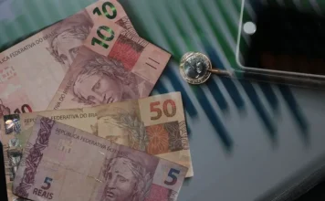 Selic cai para 13,75% com economia em desaceleração